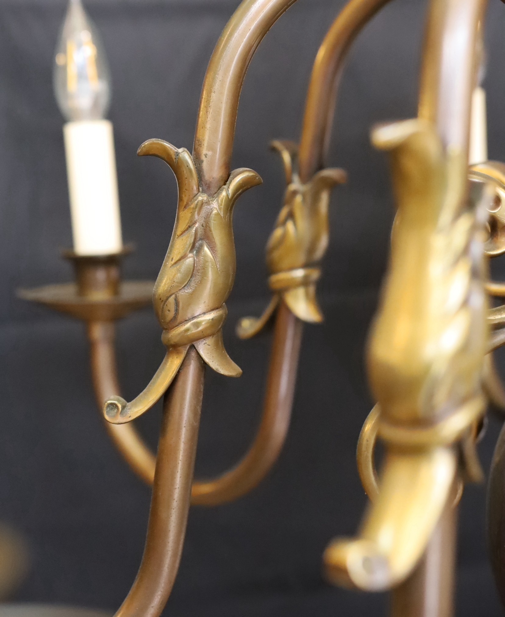 A large Dutch bronzed brass eight light chandelier, drop 70cm. width 86cm